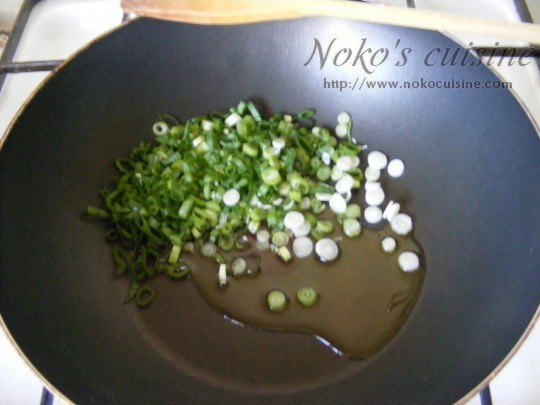 Add the green onion into a frying pan with 2 tbs olive oil