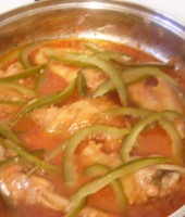 add the chicken and the cucumbers to the tomato/onion sauce