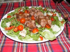 arrange a bed of rocket and add the slices of meat